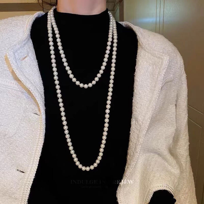 Wholesale Imitation pearl chain long necklace sweater chain with multiple loops