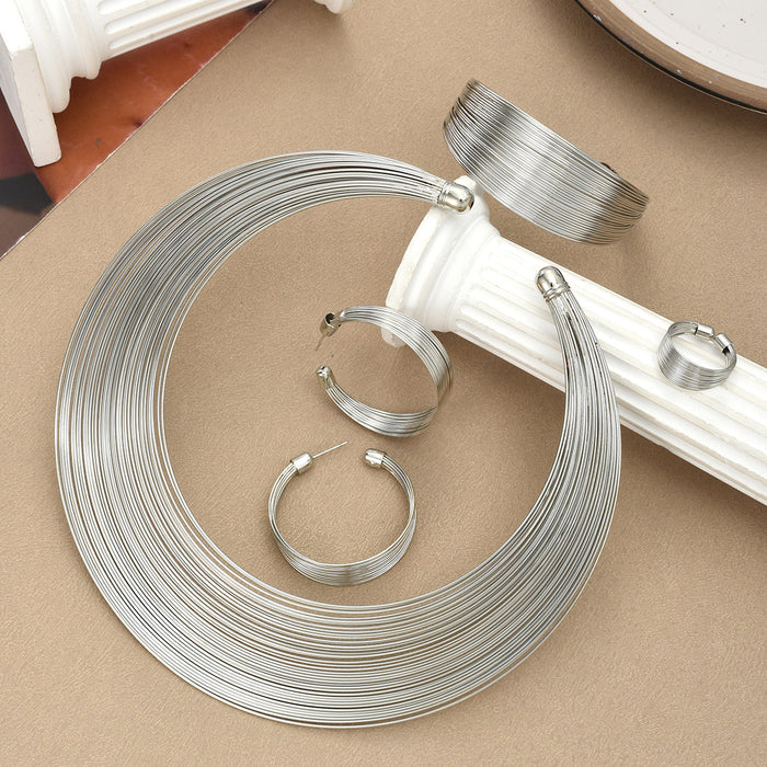 Wholesale Exaggerated metal ring-shaped multi-layered circular jewelry set.