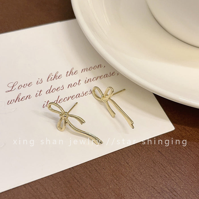 Wholesale Simple bow earrings girl fashion Joker cold wind earrings