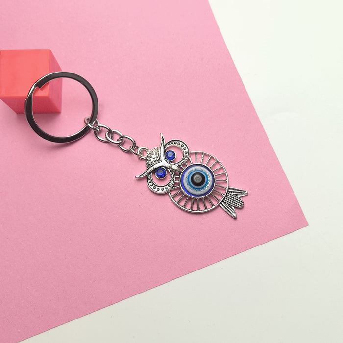 Wholesale Blue Eye Pendant Flower Butterfly Keychain Pendant Bag