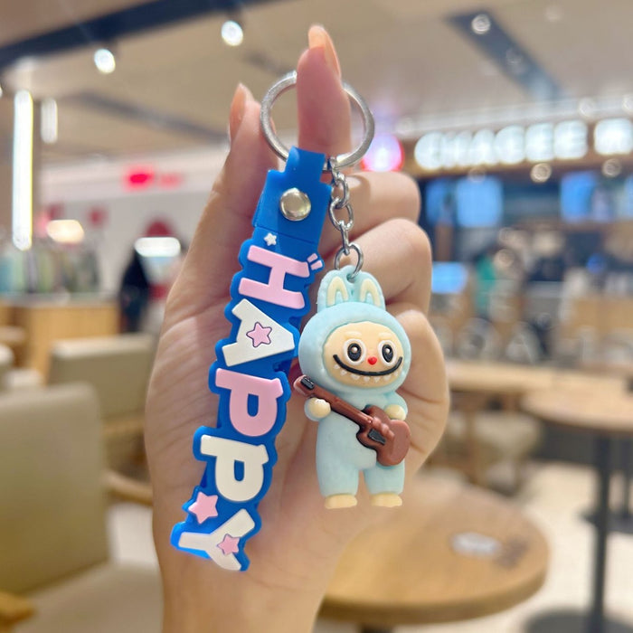 Wholesale Cute cartoon silicone keychain with cute little monster keychain for sweatshirt