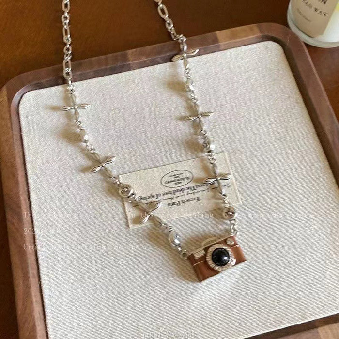 Wholesale Retro brown camera necklace with high-end design, zircon pendant, sweater chain, sweatshirt chain