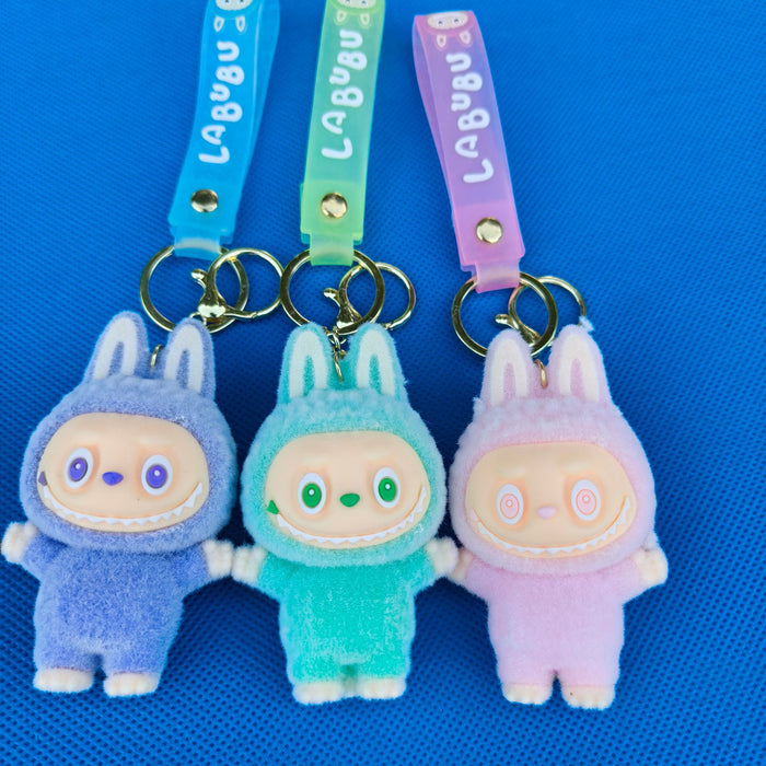 Wholesale LED light-up keychain,  cartoon bucktooth doll,  school bag pendant,  flocking doll