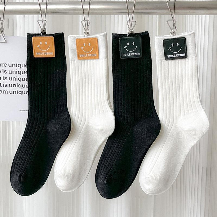 Wholesale Socks, mid tube socks, pure cotton black and white Zhuji socks, smiling face leather label, long tube socks