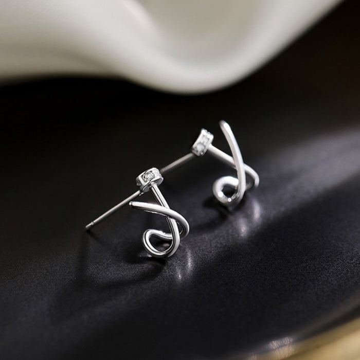 Wholesale Silver needle crossed earrings, light luxury earrings, niche design