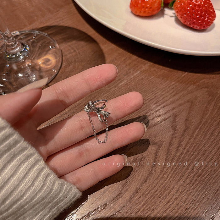 Wholesale Butterfly knot tassel ear clip without ear hole earrings, high-end and elegant temperament ear bone clip