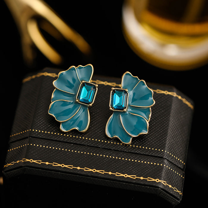 Wholesale Retro and minimalist design earrings with oil dripping, diamond studded, flower like temperament, fashionable earrings