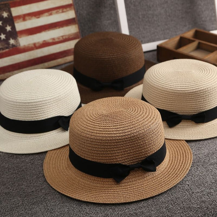 Wholesale New wide eave flat top straw hat for sun protection, vacation bow top hat for versatile sun protection