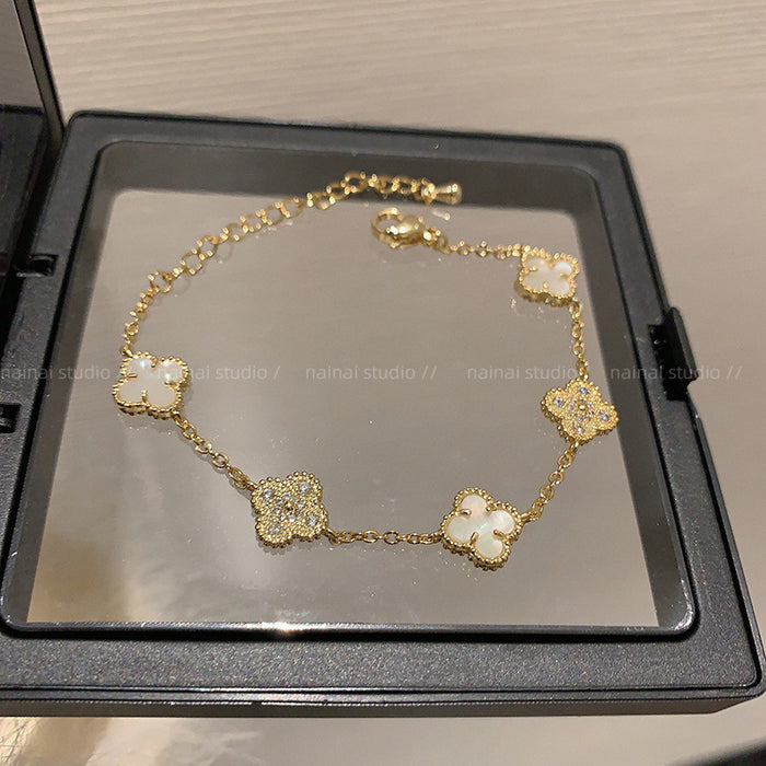 Wholesale Real Gold Electroplated Zircon Four-petal Flower Imitation Fritillaria Bracelet Light Luxury High-end Sense Bracelet Sweet All-match Bracelet Wholesale Women