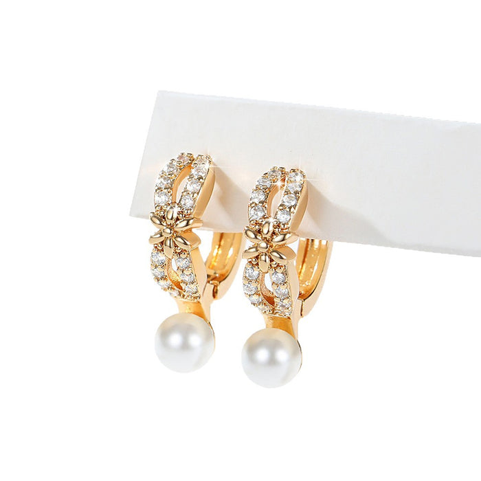 Wholesale Copper gold-plated retro light luxury simple pearl earrings, small and fashionable design, inlaid with zircon ear buckles, wholesale of ear accessories