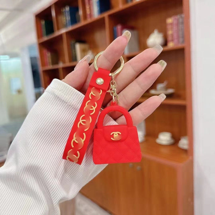 Wholesale Cartoon keychain silicone mini bag pendant car keychain fashion gift
