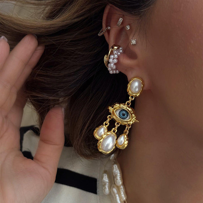 Wholesale Exaggerated personality, Devil's Eye earrings, light luxury, high-end feel, retro niche, pearl droplet earrings
