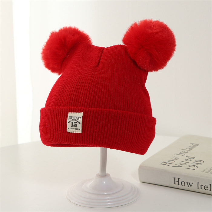 Wholesale Knitted hat with added yarn cap and fabric label