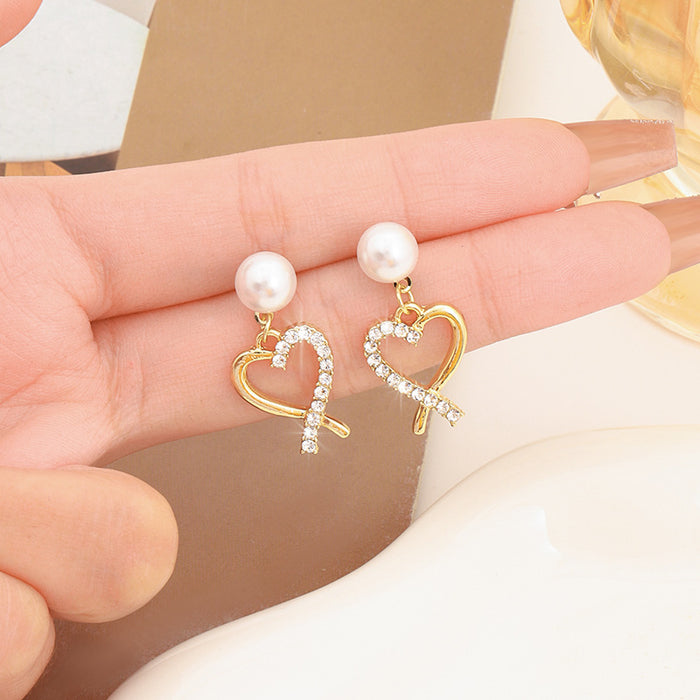 Wholesale New Fashionable Pearl Love High End Design with a Small Niche, Earrings and Accessories, Butterfly Knot Earrings, Light Luxury