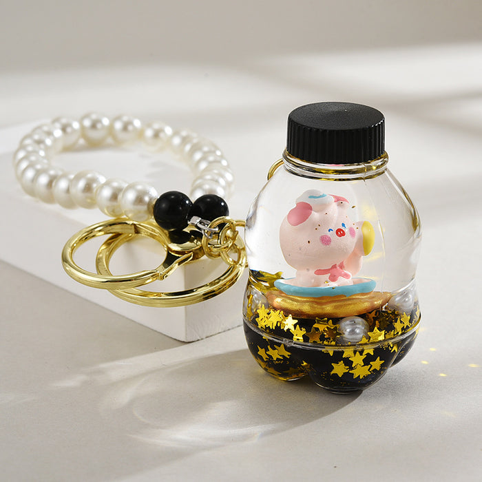 Wholesale Oil-Filled Black Gold Quicksand Piggy Liquid Keychain