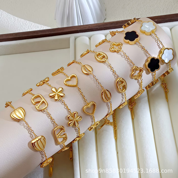 Wholesale Flower and Heart Titanium Steel Bracelet