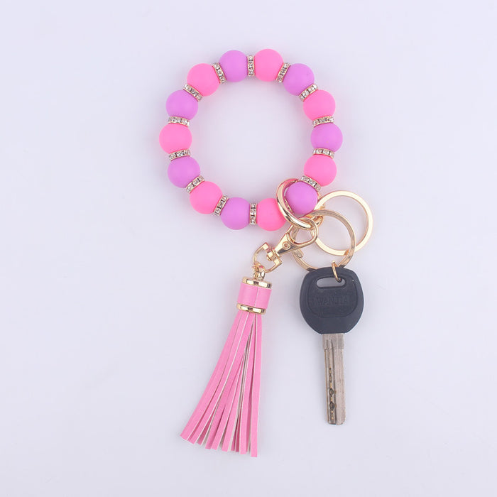 Wholesale Silicone bracelet wrist keychain tassel pendant