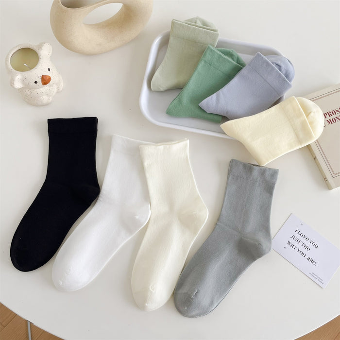 Wholesale Middle school women's solid color simple pile socks made of pure cotton