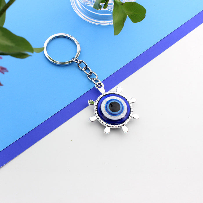 Wholesale Silver boat anchor, rudder, blue eyes, keychain, bag hanging