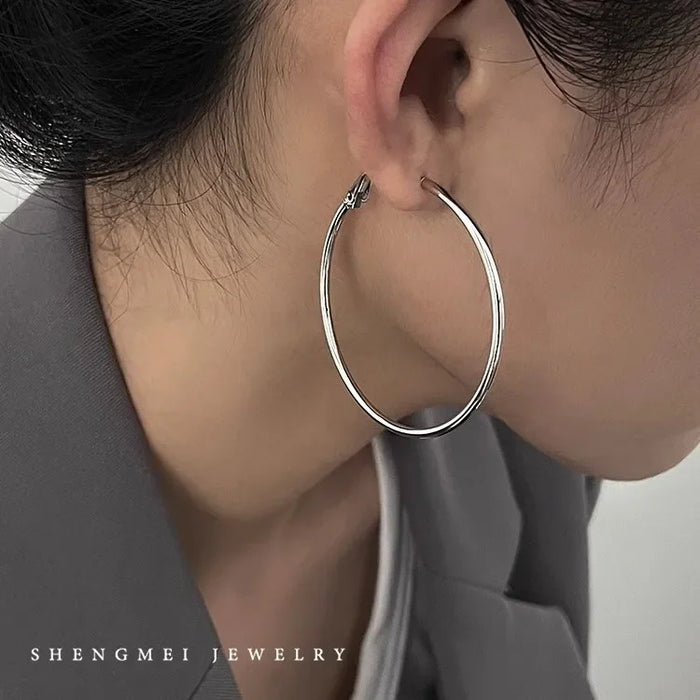 Wholesale Pure silver earrings with large circles, plain circles, and high-end feel. Round circle earrings