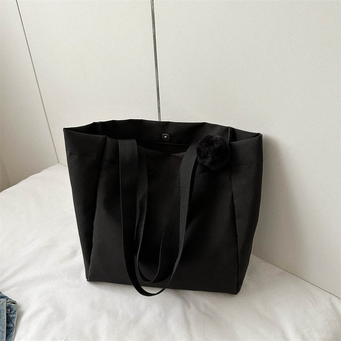 Wholesale Solid color large capacity canvas shoulder bag, simple commuting tote bag, shopping bag