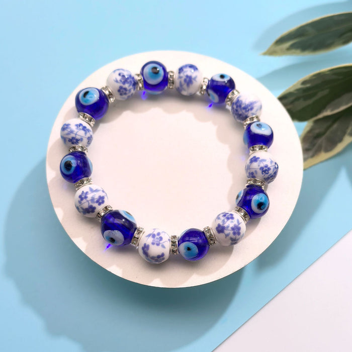 Wholesale Pearl Devil's Eye Bracelet with Micro inlaid Pearl Bracelet, Hand string Jewelry