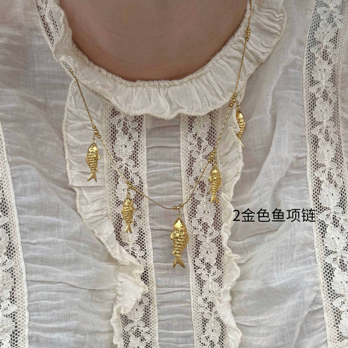 Wholesale Fashionable copper gold fish necklace with exquisite zirconium pendant necklace, collarbone chain, electroplated gold