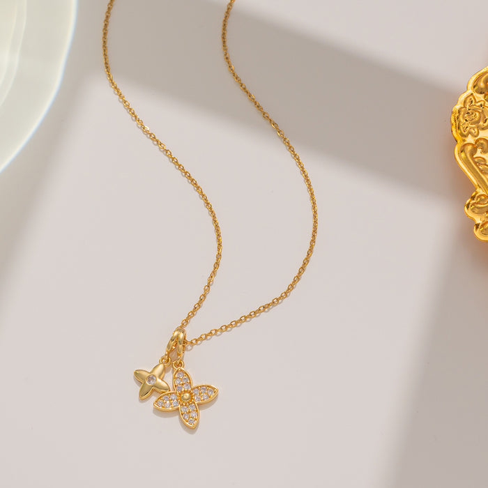 Wholesale Design a new double four leaf flower necklace for women, with a luxurious, sweet, trendy, and cool feel that won't fade. Clavicular chain