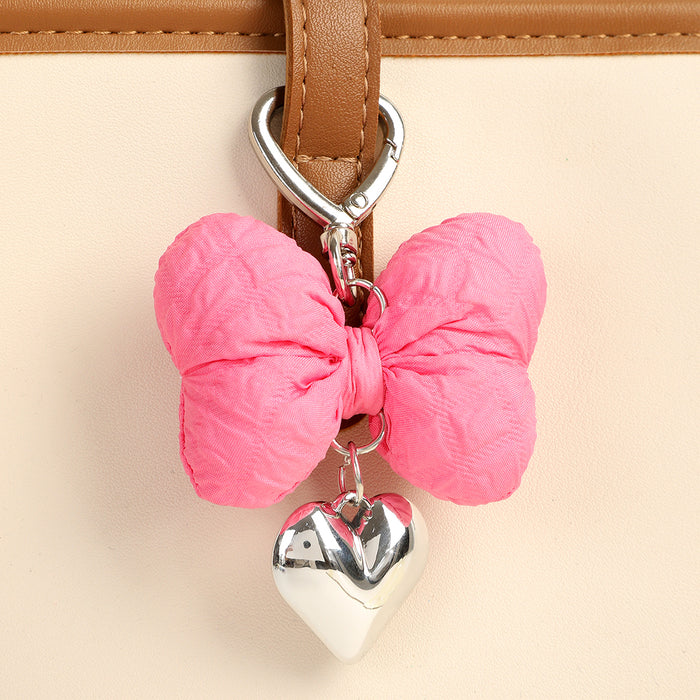 Wholesale Creative new cute bow pendant with high-end metal heart keychain decoration