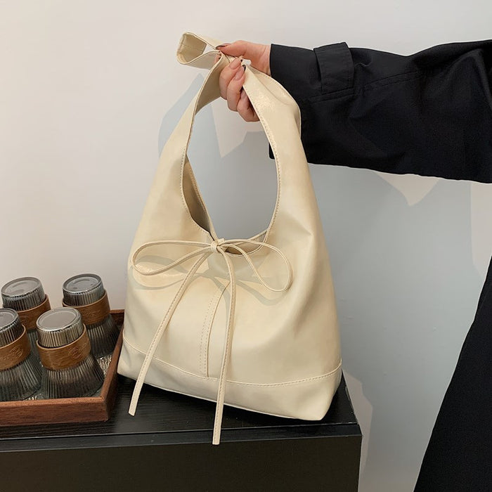 Wholesale Small commuting bag, versatile leisure bag, bow tie, large capacity single shoulder underarm tote bag