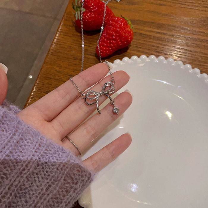 Wholesale Bow necklace pendant with diamond studded collarbone chain, niche design, versatile accessory