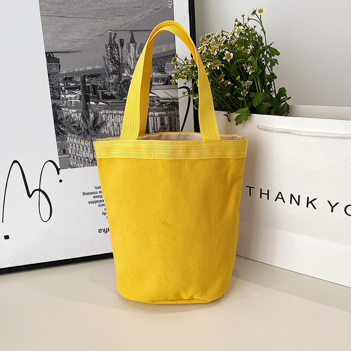 Wholesale Cute cartoon printed bucket bag, hand-held canvas bag