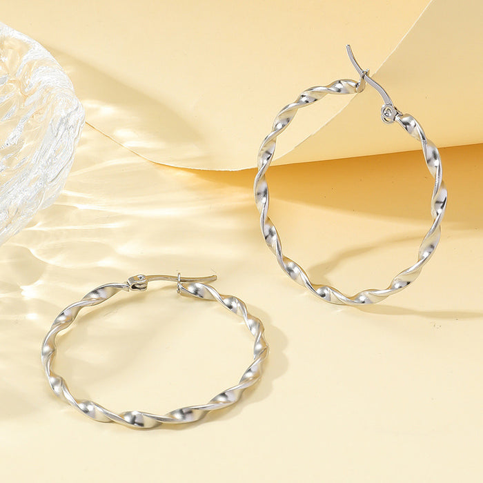 Wholesale Minimalist plain circle spiral stainless steel earrings for women, fresh and niche design, titanium steel earrings