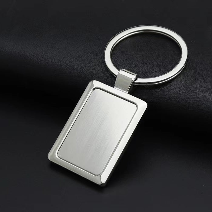 Wholesale Fashionable zinc alloy single row keychain, car anti loss keychain pendant, blank hanging tag, double-sided laser drip adhesive