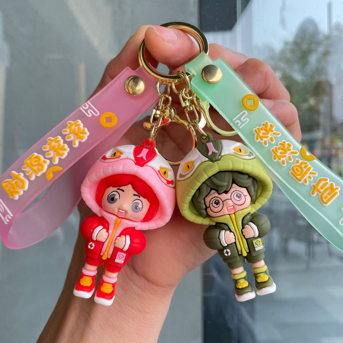 Wholesale Couple keychain, handbag pendant, car keychain, doll machine, small gift