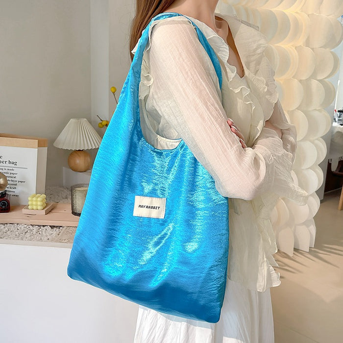 Wholesale Small niche design, environmentally friendly silver shoulder bag, large capacity leisure commuting shopping bag, handheld