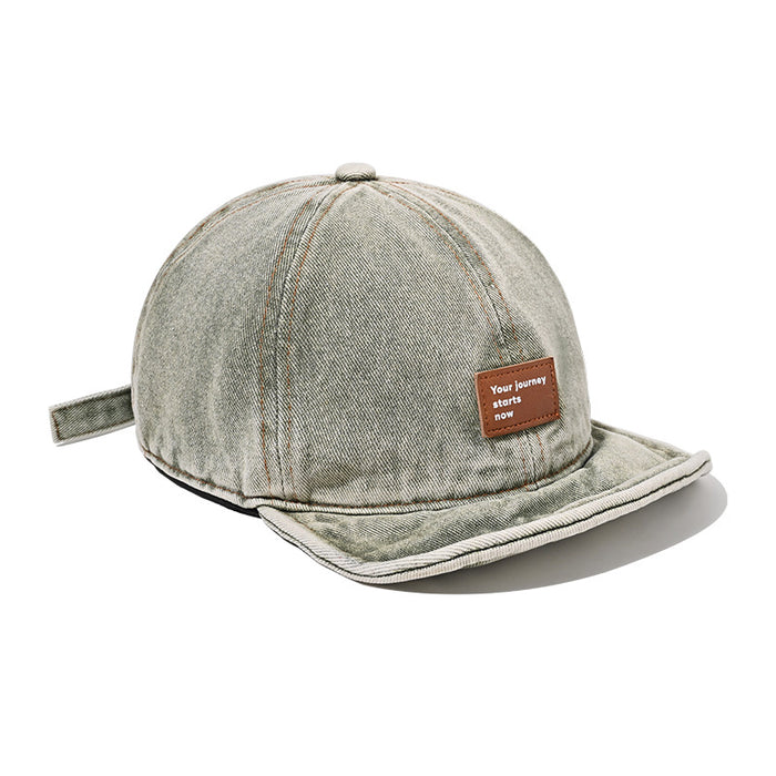 Wholesale Retro soft top baseball cap washed with water, short brimmed duckbill cap made of old leather label hat