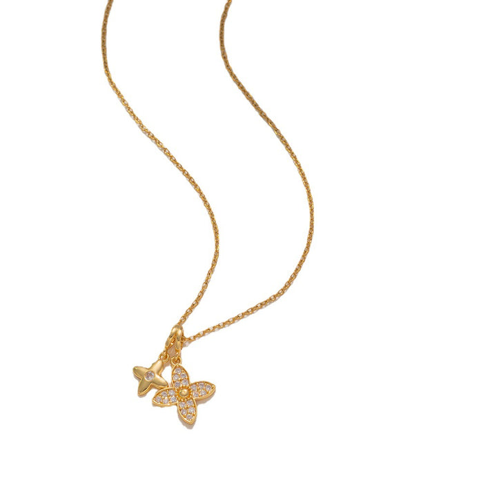 Wholesale Design a new double four leaf flower necklace for women, with a luxurious, sweet, trendy, and cool feel that won't fade. Clavicular chain