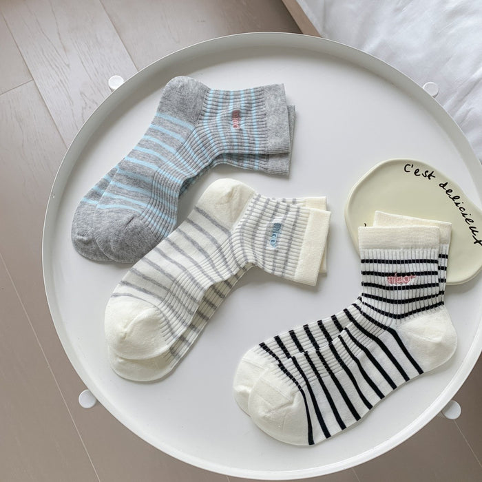 Wholesale Ultra transparent fine striped embroidered versatile mid length socks