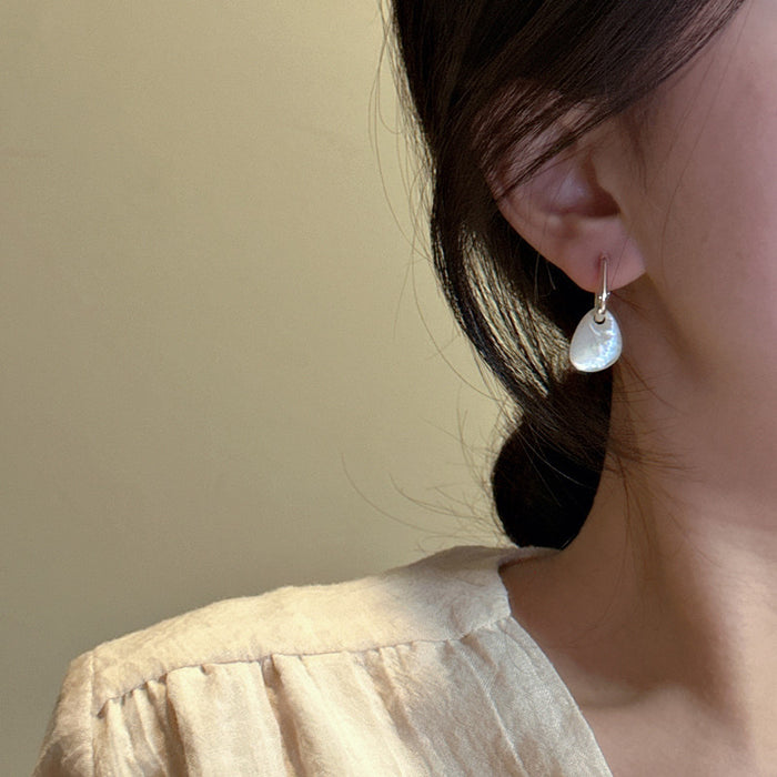 Wholesale Sterling silver niche design, irregular white shell earrings, fashionable texture, ear accessories