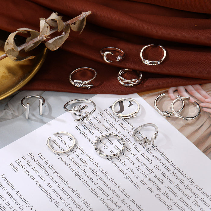 Wholesale Amazon's New Star Moon Letter Leaf Arrow Joint Ring Heart Knot Knot Knot Ring 12 Piece Set