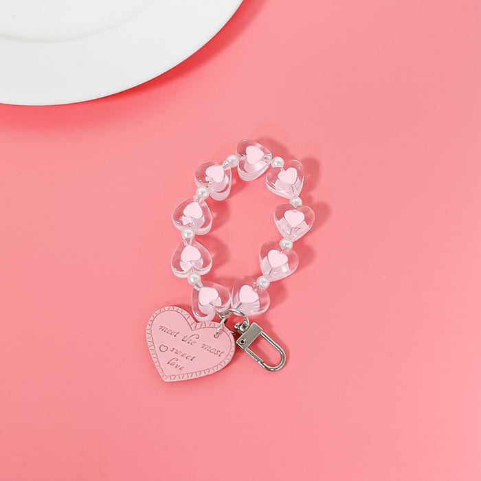 Wholesale fresh simple color love hand chain transparent acrylic chain mobile case accessories