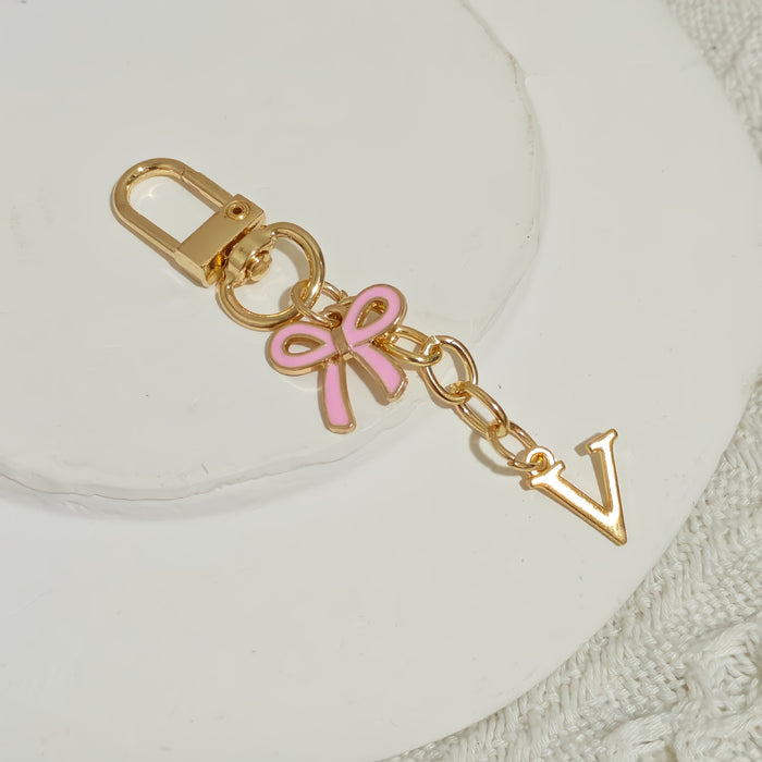 Wholesale Pink bow A-Z keychain alloy accessory