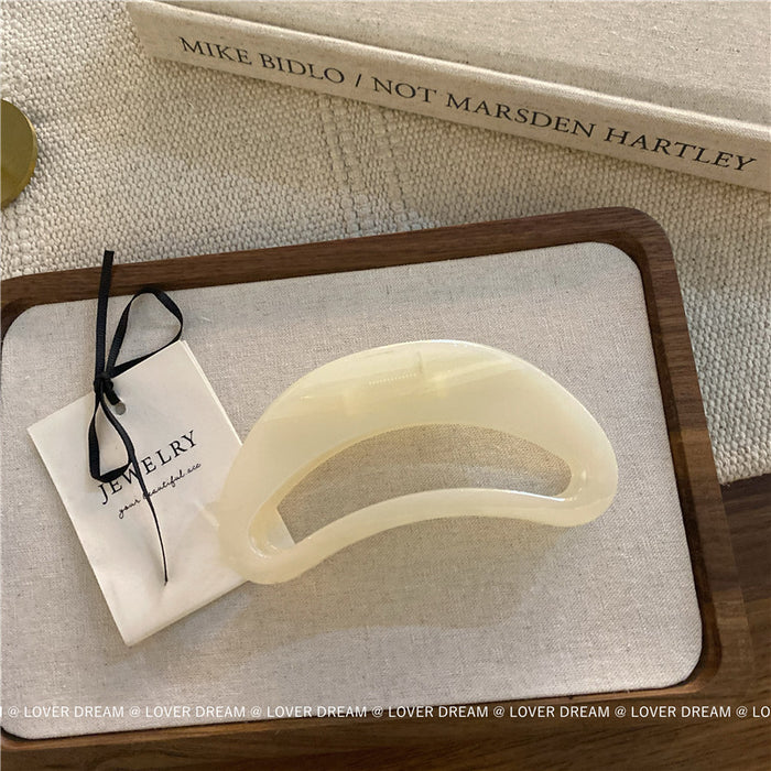 Wholesale Pink semi-circular hair clip with shark clip at the back of the head, versatile hair accessory