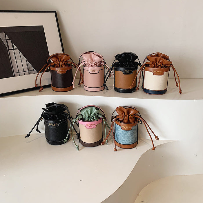 Wholesale Children's bag, contrasting color drawstring bucket bag, new retro crossbody bag for girls