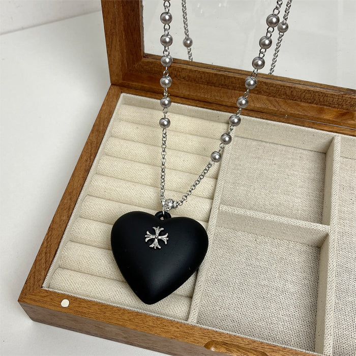 Wholesale Black cross heart pendant necklace, women's light luxury high-end feeling, pearl sweater chain long, versatile accessories for autumn and winter