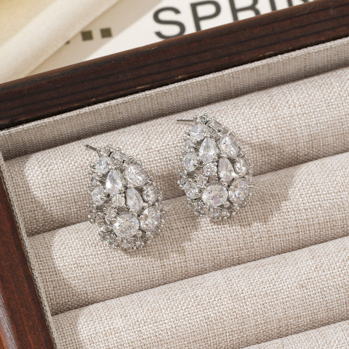 Wholesale High end earrings with full diamond and zircon inlay, silver needles, niche design, hollowed out earrings accessories