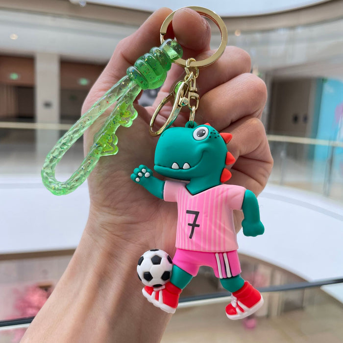 Wholesale Creative new football dinosaur keychain, exquisite and cute soft plastic figurine pendant, bag accessories, small gifts