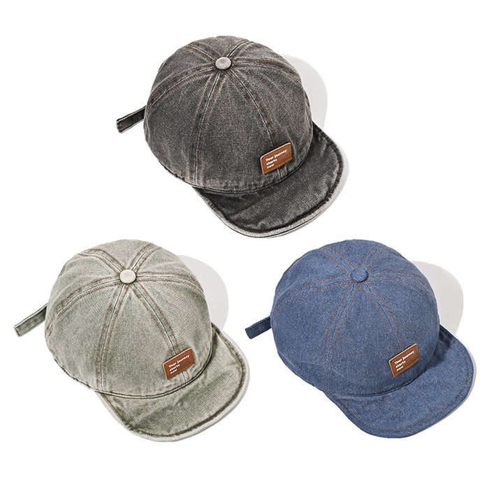 Wholesale Retro soft top baseball cap washed with water, short brimmed duckbill cap made of old leather label hat