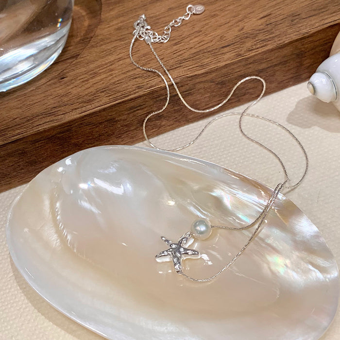 Wholesale Titanium steel necklace, pearl pendant, light luxury, niche, collarbone chain, high-end accessory